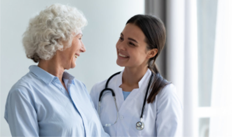  skilled nurse looking at the senior woman