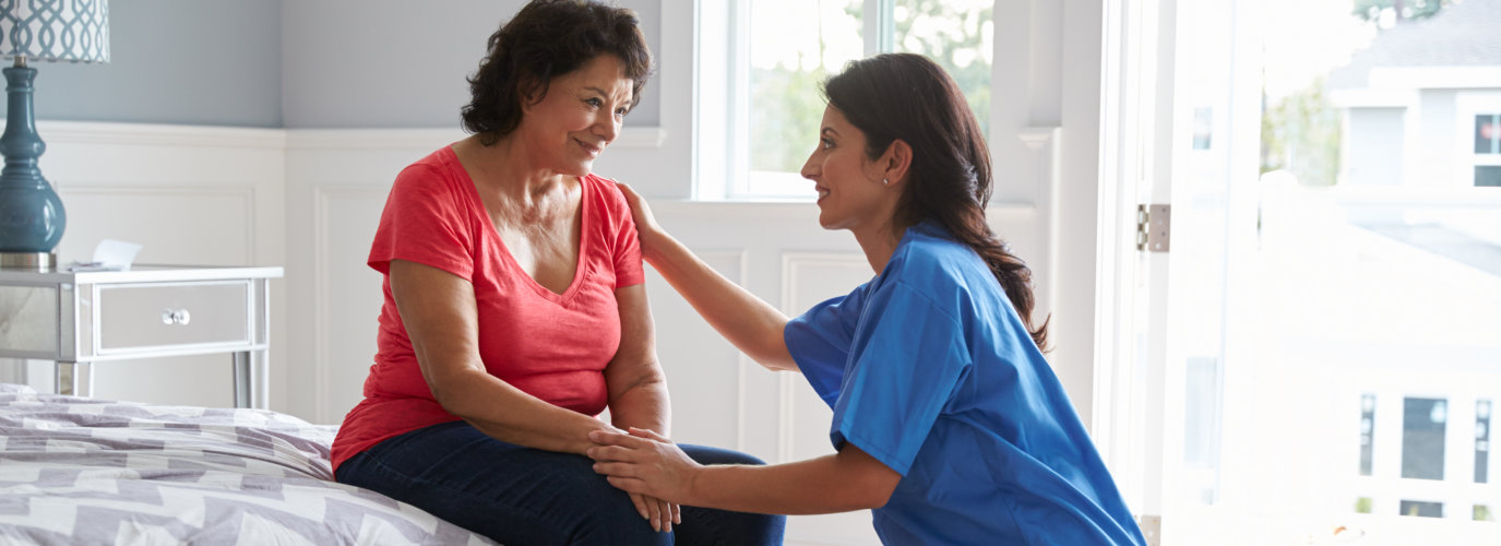 caregiver and elder woman